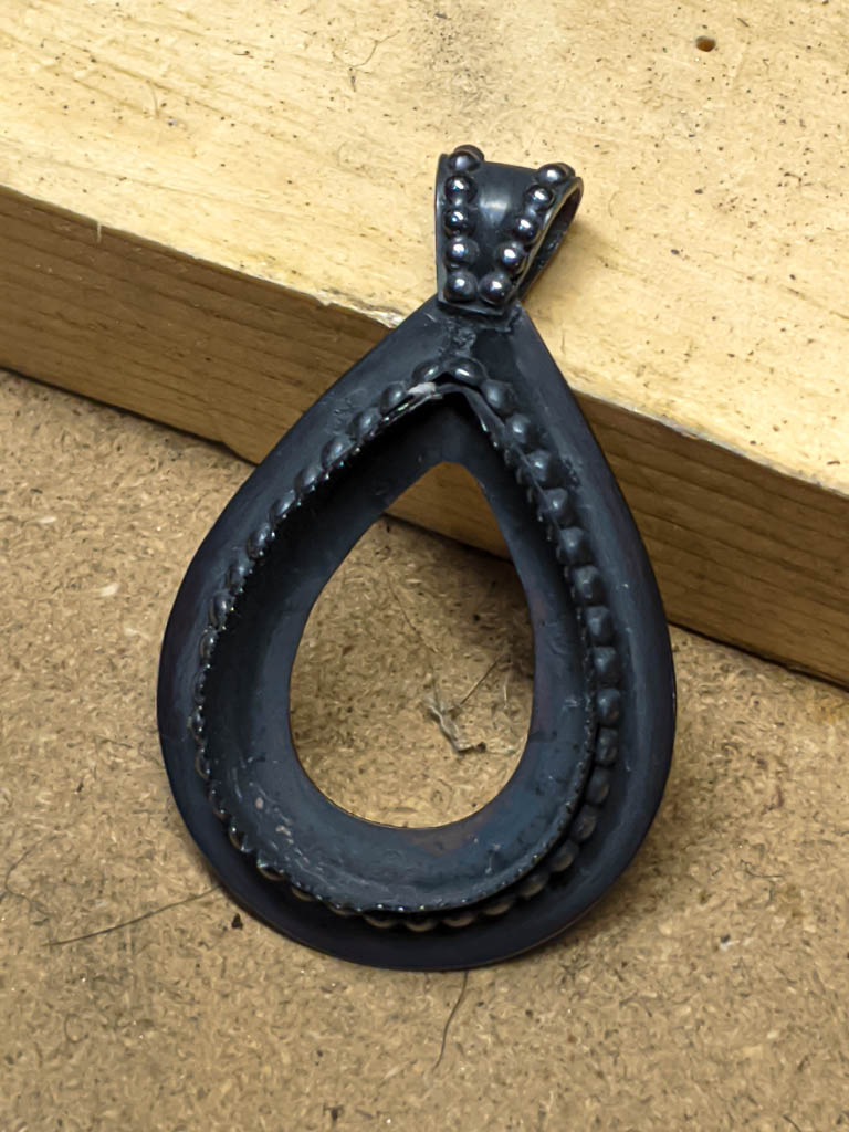 Pear-shaped setting for cabochon, before photo showing patina