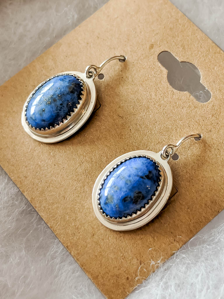 Handmade denim lapis vintage-inspired drop earrings, from the side, showing more of the imperfections in the stones